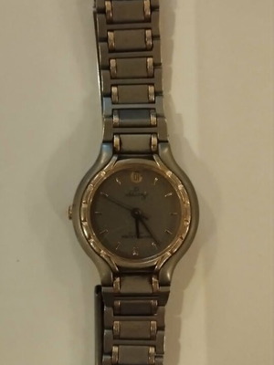 Favre Leuba women's watch titanium and gold like new