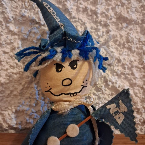 Vintage New Democracy Collectible Doll like new with historic torch emblem