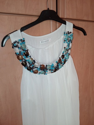 Sleeveless dress or top with rich neckline decoration, new, white