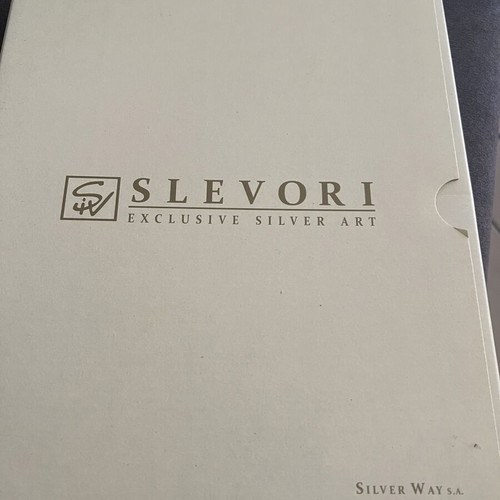 Silver photo frame new, slight tear on back plastic