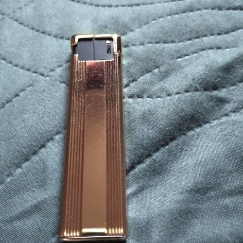 Ted Lapidus lighter used, gold plated