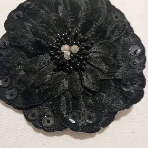 Velvet brooch new in black color with flower shape