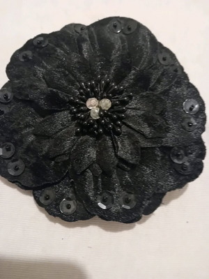 Velvet brooch new in black color with flower shape