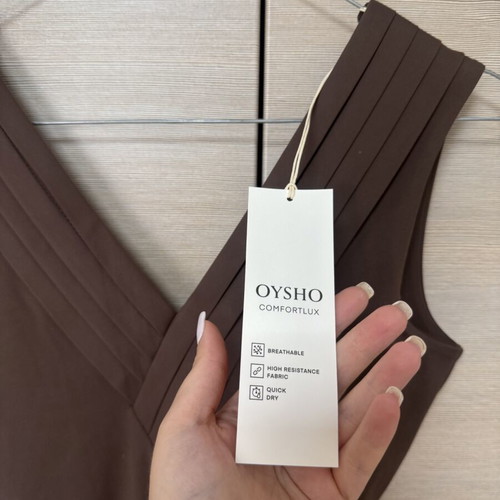 Oysho Comfortlux compression jumpsuit with V open back, size S