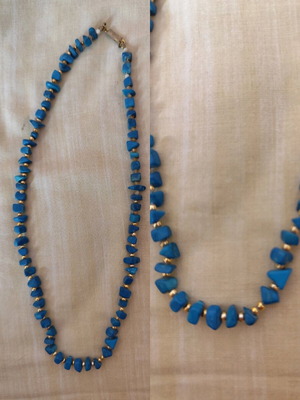 Necklace with precious stones like new, blue and gold details
