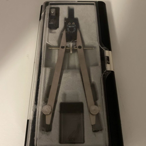 Compass used with box, sharpener, and replacement tips