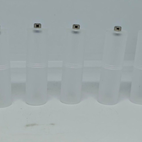 Battery adapters AA to C set of 8, like new, plastic transparent