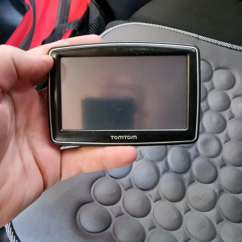 Gps navigator used without mount, with car charger