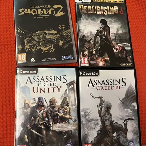 PC Games pack of 4 like new with Assassin's Creed, Total War Shogun 2, Dead Rising 3