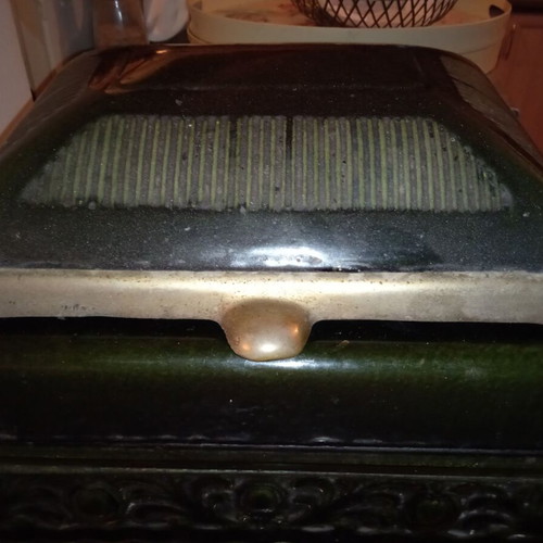 Cast iron stove used for briquettes and wood