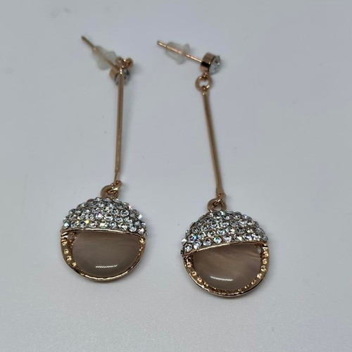 Earrings rose gold with cat eye and rhinestones like new
