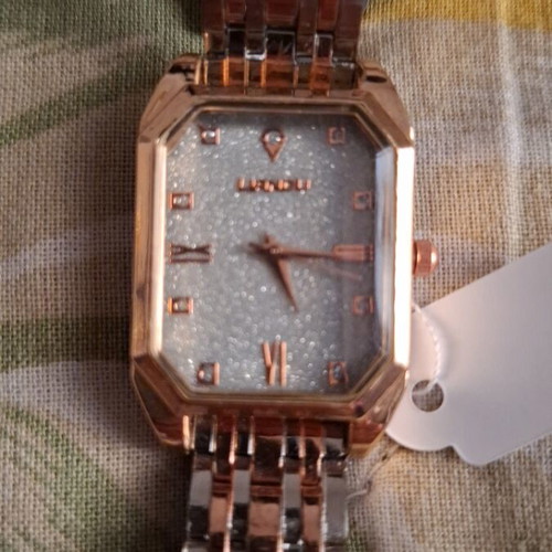 Wristwatch new, pink gold and silver with bracelet