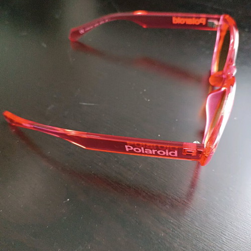 Polaroid PLD 6051/G/S sunglasses like new, transparent red with orange lens