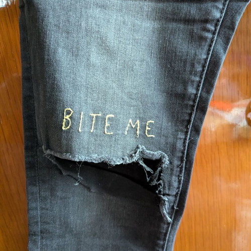 One Teaspoon Jeans size 28 like new, black with knee rip and 'bite me'