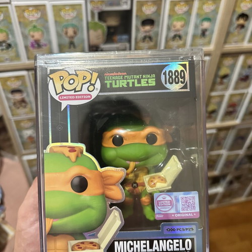 Funko Pop Michelangelo Teenage Mutant Ninja Turtles vinyl figure eating pizza