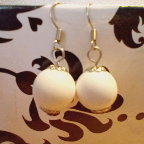 White hanging earrings used