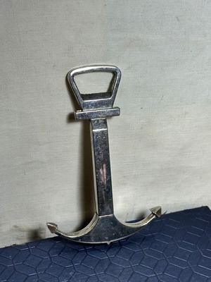 Vintage bottle opener and corkscrew anchor design used