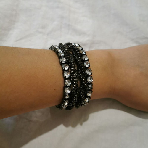 Bracelet used with strass and braided chain detail
