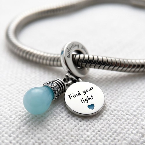 Pandora Glow in the Dark Lightbulb Charm new, silver and turquoise