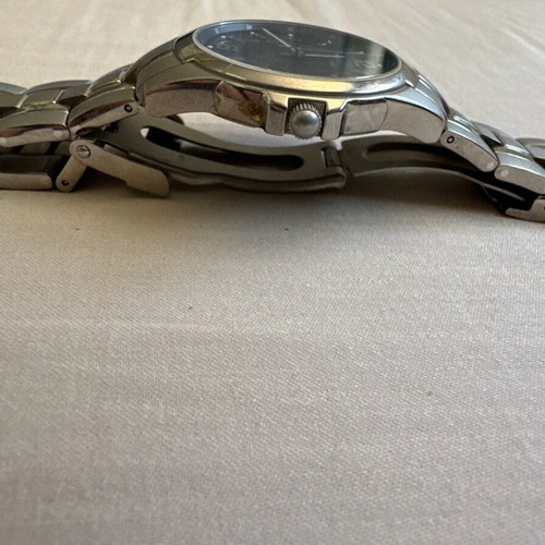 Candino Swiss watch titanium with blue dial and silver bracelet like new