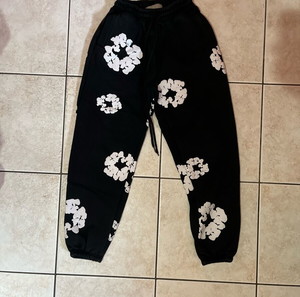 Denim Tears (Cotton Wreath-print track pants)
