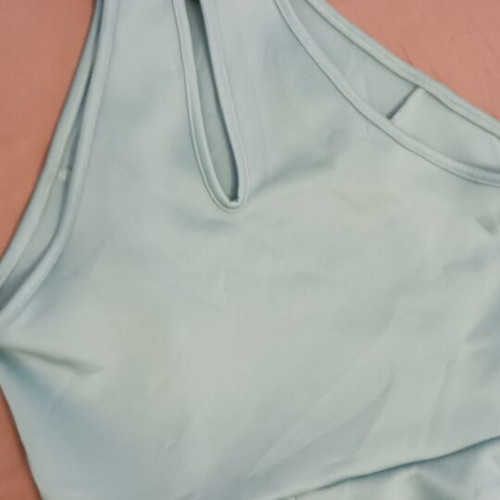 Sleeveless dress like new with impressive back in silver pistachio color