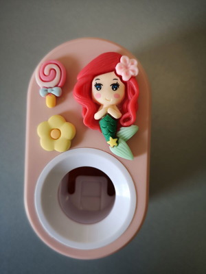 Children's wall toothpaste squeezer like new, mermaid design