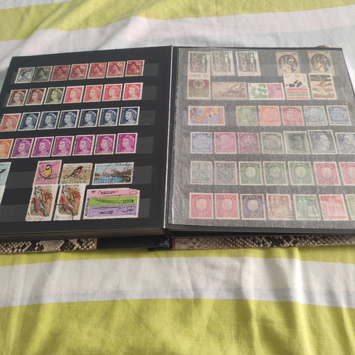 Stamps like new, 702 pieces with album