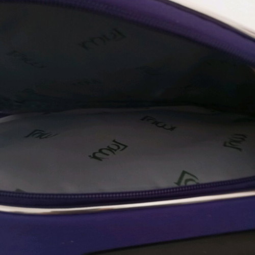 Small travel suitcase purple like new with many compartments