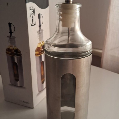 ITEM International glass oil bottle with stainless steel casing