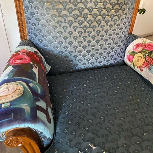 Classic armchair used with wear, needs reupholstery