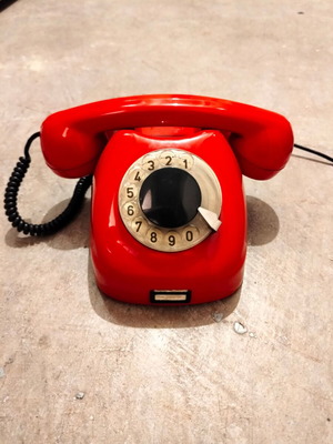 Tesla red analog rotary phone used, vintage 1973