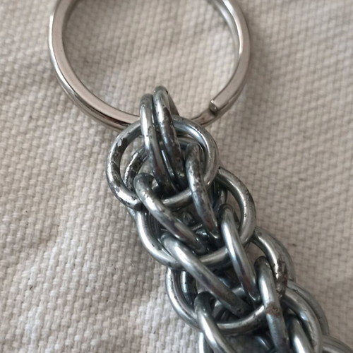 Steel keychain like new, Persian knot