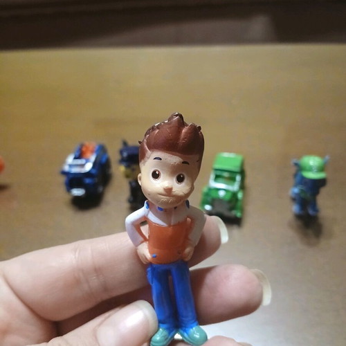 7 Mini Paw Patrol Figures Like New with Vehicles