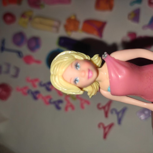 Polly Pocket bag with 9 dolls and accessories used