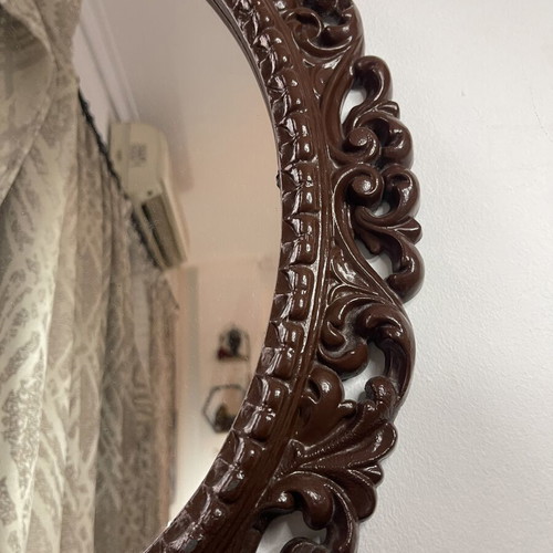 Vintage oval wall mirror with embossed frame