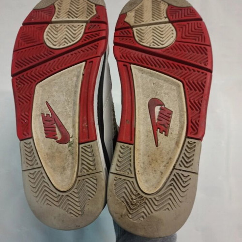 Jordan 4 Fire Red sneakers used, size 41, visible wear