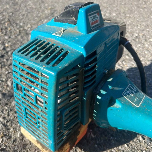 Brushcutter with metal 3T blade, professional shoulder strap, used