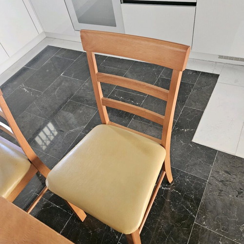 Wooden kitchen dining set used with 4 yellow leather chairs