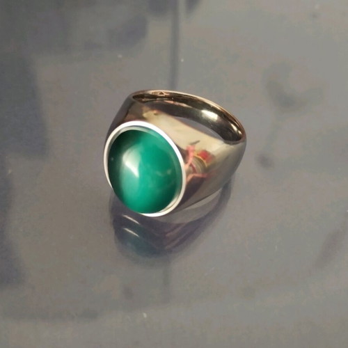 Steel ring with green stone like new