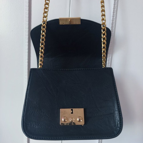 Classic black crossbody bag like new with gold chain for evening wear
