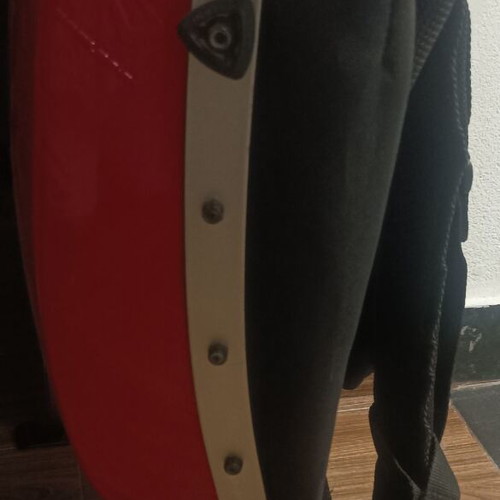Backpack like new, red, hard shell, waterproof, carbon fiber