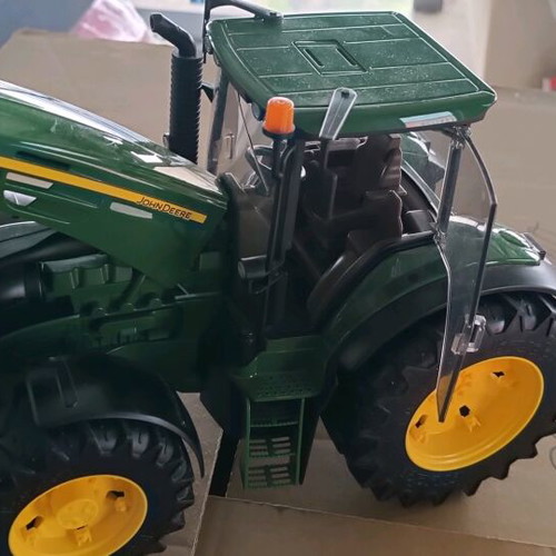 John Deere tractor like new, Bruder toy replica with opening parts