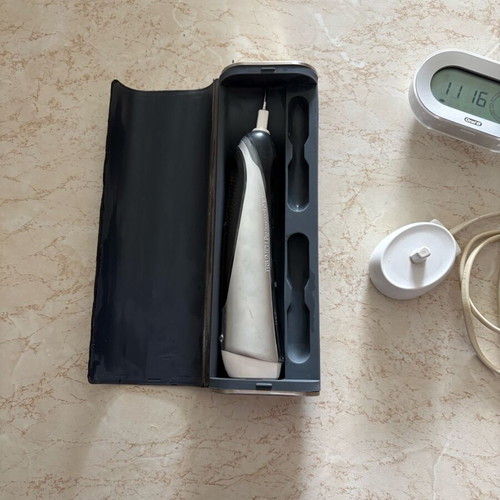 Oral-B Triumph IQ 5000 electric toothbrush used