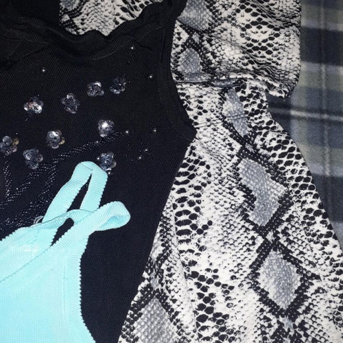 Box skirts and tops size small like new, black and colorful