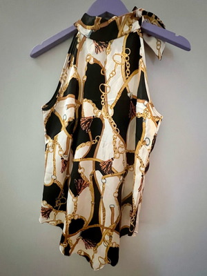Made in Italy sleeveless blouse like new with chain designs blue sand