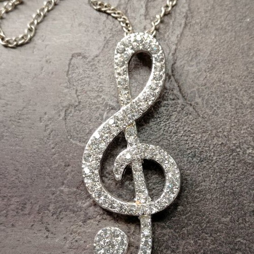 Pendant necklace with treble clef and rhinestones like new