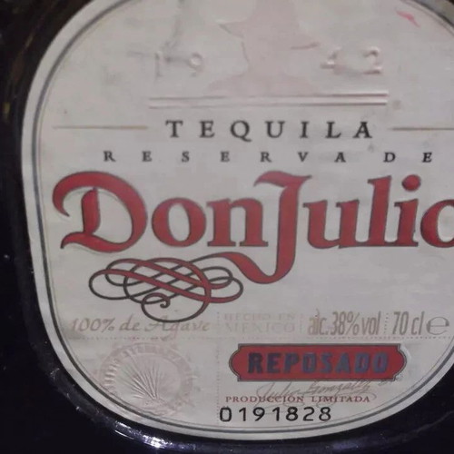 Don Julio Reposado Amber empty tequila bottle 750 ml glass with Greek text used