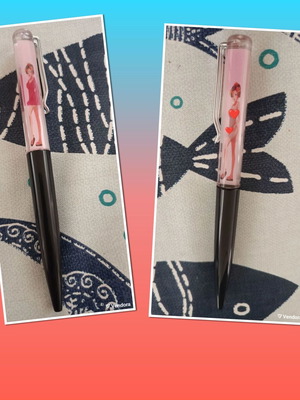 Vintage floaty pen with water in like-new condition