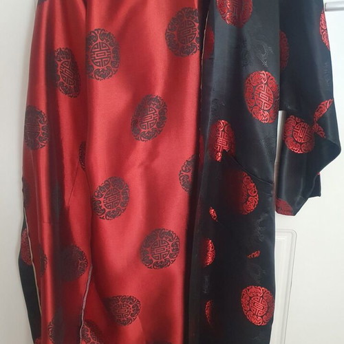 Silk robe with Chinese designs like new, sizes M to XL